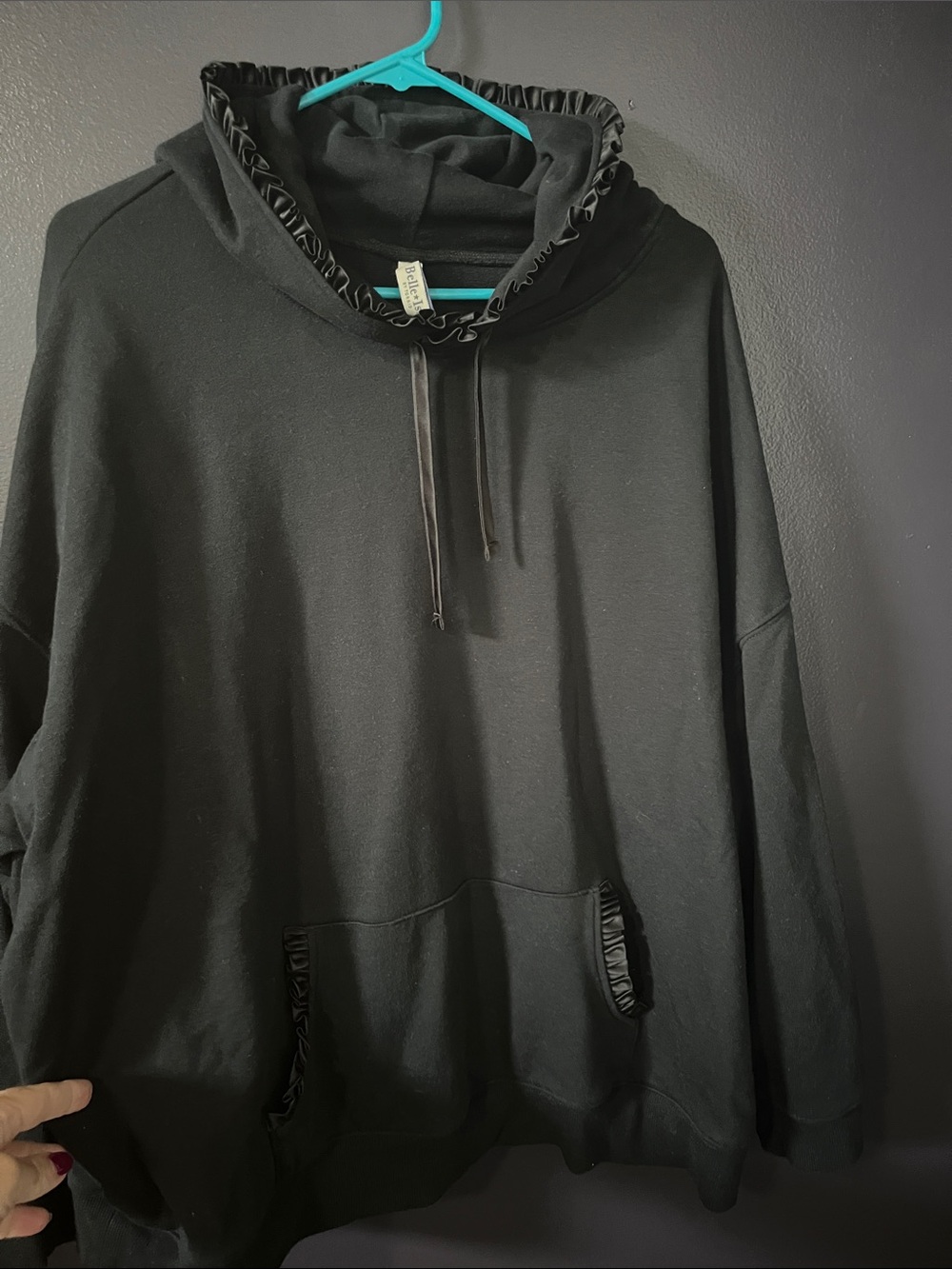 Black hoodie with ruffle hood
